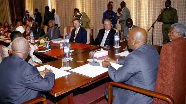 Sierra Leone's President Ahnad Kabbah attends a meeting with UNSecretary General Kofi Annan