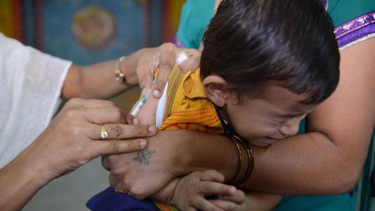 A child is vaccinated in Hyderabad