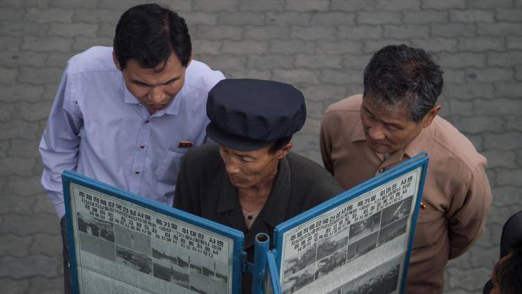 North Koreans read about Pyongyang’s missile launch