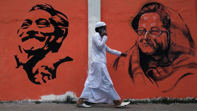 A poster of Bangladesh’s founding father Sheikh Mujibur Rahman and prime minister Sheikh Hasina, his daughter, in Dhaka