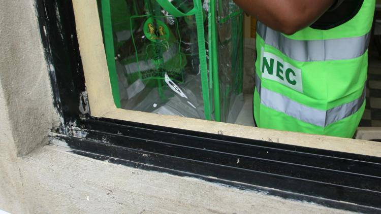 A Nigerian official checks the ballot box in Port Harcourt, Nigeria, 2007.