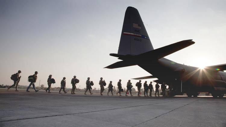 US soldiers board a plane at Baghdad. Salem says Iraq could be the most significant country to watch