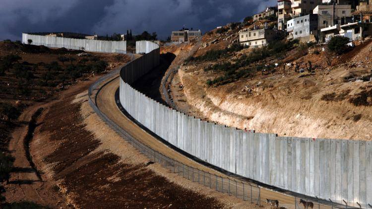 The Israeli concrete separation wall at Abu Dis, on the eastern edge of Jerusalem