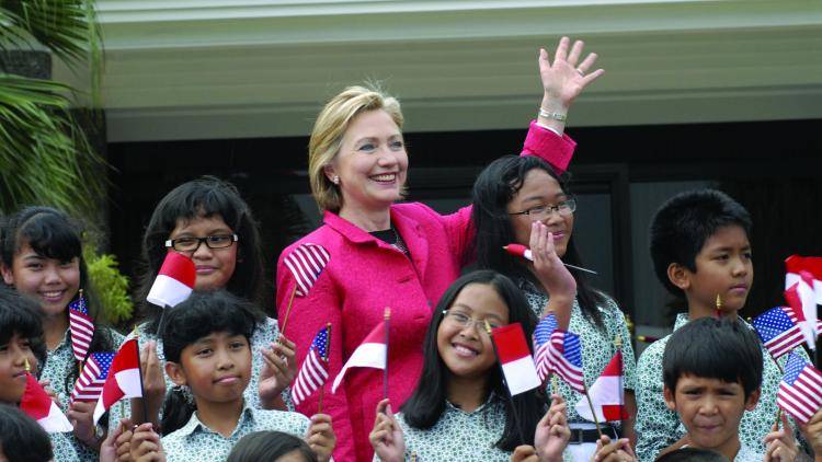 US Secretary of State Hillary Clinton with students of Menteng elementary school 1 in Jakarta, once attended by President Barack Obama.