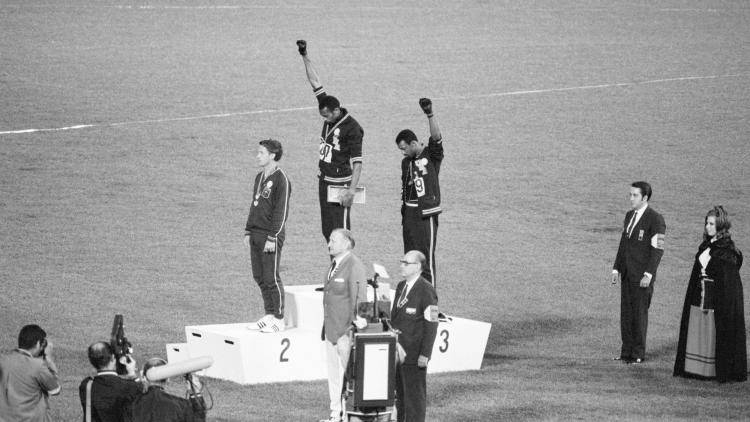 Tommie Smith and John Carlos on the podium at the Mexico City Olympics in 1968