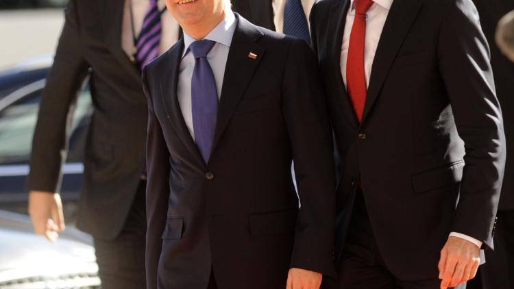 Russia's President Dmitry Medvedev and NATO Secretary General Anders Fogh Rasmussen on the right. 