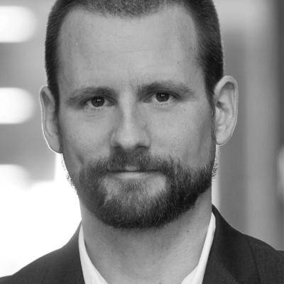 Headshot of Thomas Juneau