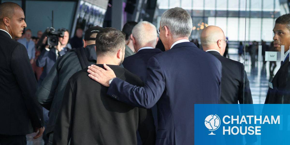 Ukrainian president Volodymyr Zelensky (L) is welcomed by NATO secretary general Jens Stoltenberg at the start of his first visit to NATO's headquarters since the start of Russia's invasion of Ukraine, in Brussels on 11 October 2023. Photo by SIMON WOHLFAHRT/AFP via Getty Images.