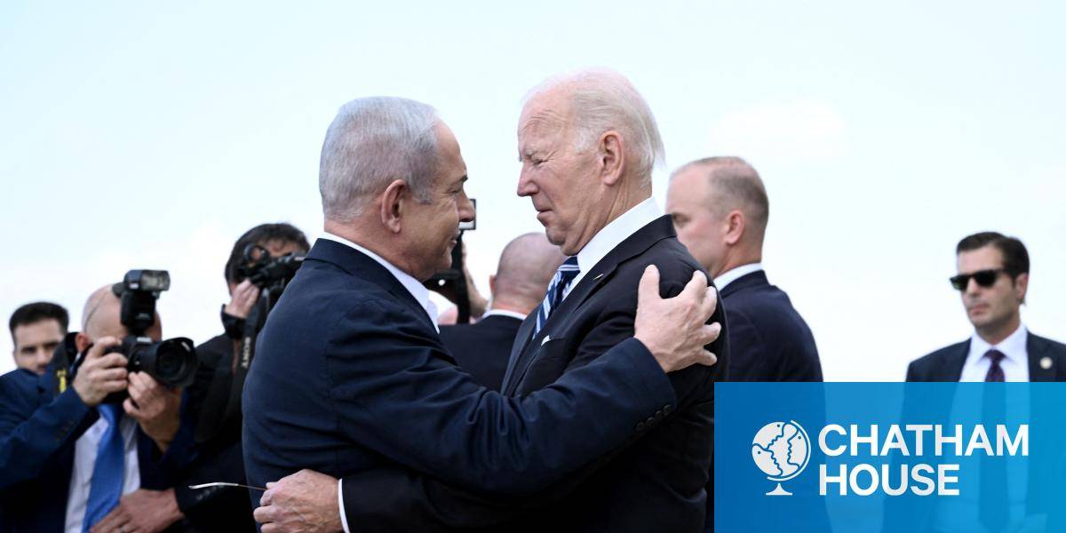 Israeli Prime Minister Benjamin Netanyahu greets US President Joe Biden upon his arrival at Tel Aviv's Ben Gurion airport on October 18, 2023