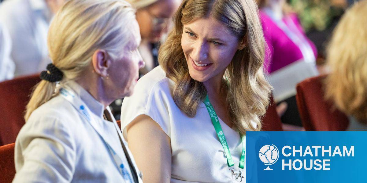 Guests chat during a Chatham House event