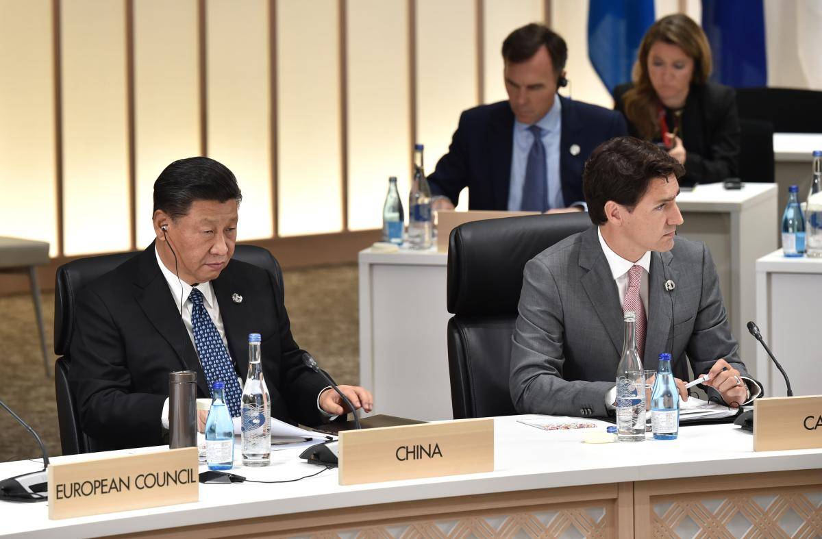 China’s President Xi Jinping and Canada’s Prime Minister Justin Trudeau attend
a session on women’s workforce participation, future of work and aging societies at the
G20 Summit on 29 June 2019 in Osaka, Japan.
Photo credit: Copyright © Kazuhiro NOGI/Pool/Getty