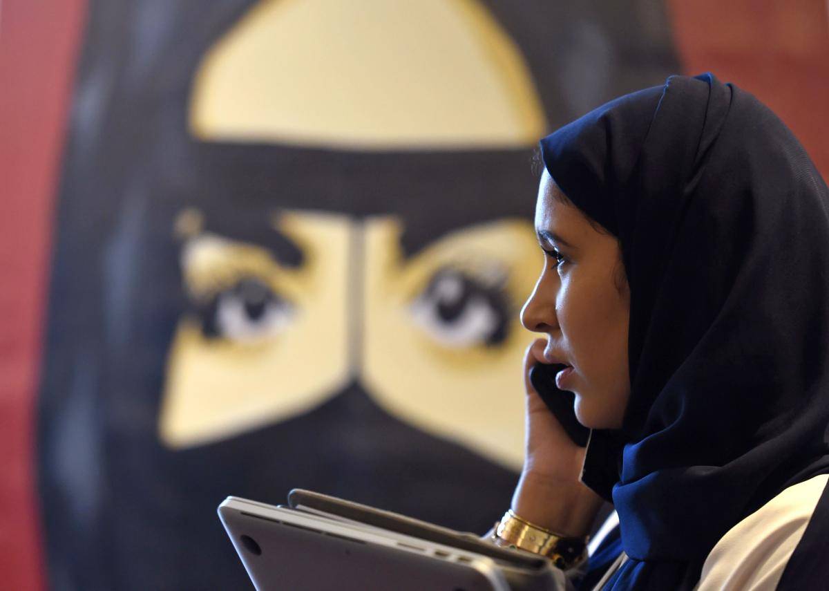 A Saudi woman talks on her phone during the ‘MiSK Global Forum’, held in Riyadh under the slogan ‘Meeting the Challenge of Change’, on 15 November 2017. Photo: Fayez Nureldine/AFP/Getty Images.