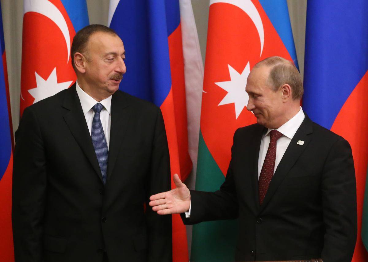 Azerbaijan's President Ilham Aliyev and Russian President Vladimir Putin during the Caspian Sea Summit in September 2014. Photo: Sasha Mordovets/Getty Images