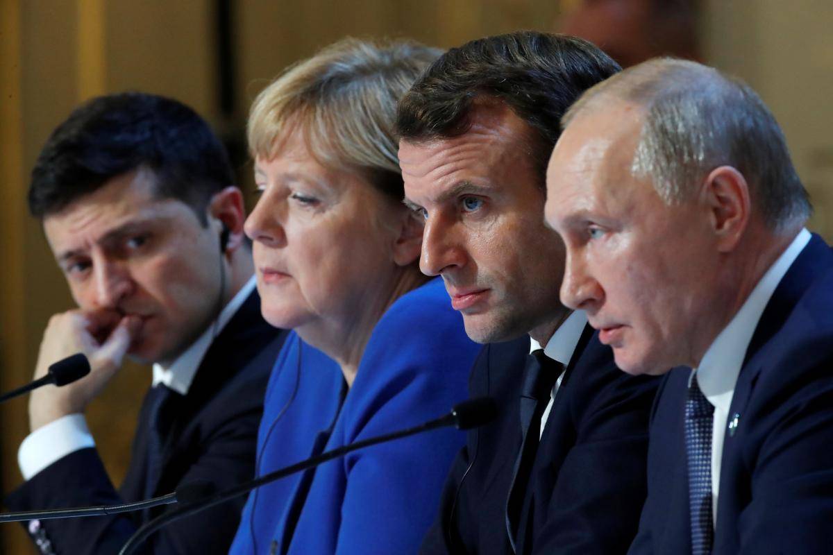 Volodymyr Zelenskyy, Angela Merkel, Emmanuel Macron and Vladimir Putin attend a press conference after a summit on Ukraine at the Élysée Palace in Paris, 9 December 2019. Photo: Charles Platiau/Pool/AFP/Getty Images