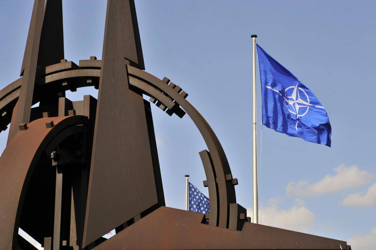 The NATO flag at NATO headquarters in Brussels, 2 March 2014. Photo: Getty Images.