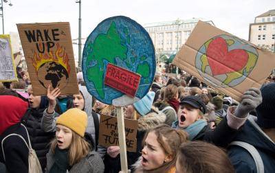 Students demonstrate for climate action in front of the city hall in Hamburg, Germany on 18 January 2019. Photo: Getty Images.