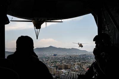 Members of the 777 Special Mission Wing transport the chief of general staff of the armed forces Gen. Mohammad Yasin Zia, to Camp Morehead, near Kabul, Afghanistan, 28 April 2021. Photo: MARCUS YAM / LOS ANGELES TIMES via Getty Images.
