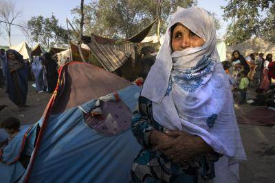 Displaced Afghans from the northern provinces arrive at a makeshift camp in Kabul, Afghanistan as the Taliban&nbsp;takes&nbsp;control of&nbsp;the country. Photo by Paula Bronstein /Getty Images.