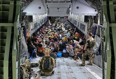 Evacuees from Kabul&nbsp;arrive at Tashkent, Uzbekistan in&nbsp;a military aircraft following the Taliban takeover of Afghanistan. Photo by Handout/Bundeswehr via Getty Images.