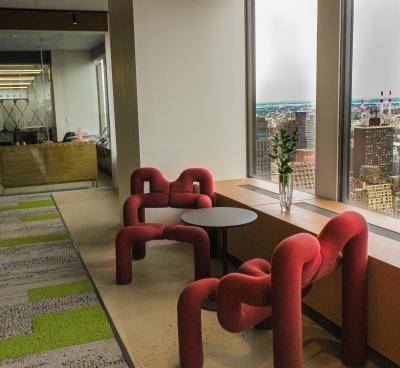 Norway's mission to the UN with a carpet recalling the country's forests floors and striking red chairs by Terje Ekstrom