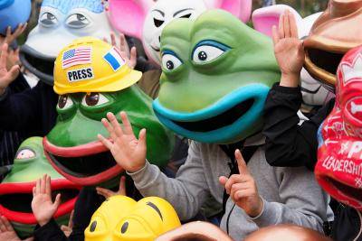 Protestors in Hong Kong wear large Pepe the Frog masks that cover their whole heads