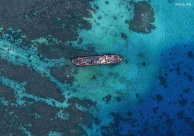 satellite image of Philippines military vessel BRP Sierra Madre aground on Second Thomas Shoal, South China Sea