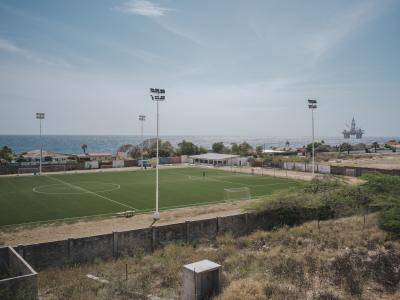 empty football pitch next to the sea 