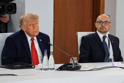 US President Donald Trump, left, and Demis Hassabis, then chief executive of Google DeepMind, at a meeting of G7 members, partner countries and AI business leaders as part of the G7 summit, in Evian, France, on 17 June, 2026.