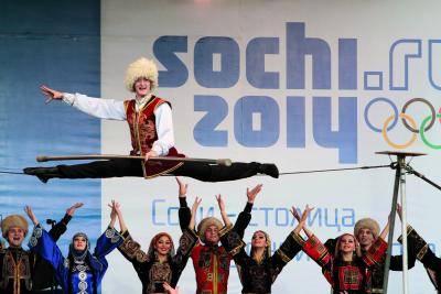A boy performs during the international youth peace camp in Sochi, Russia 