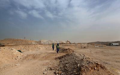 Foreign labourers work at the construction site of the al-Wakrah football stadium, one of the Qatar's 2022 World Cup stadiums. Photo by Getty Images.