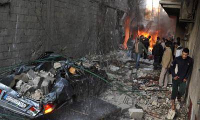 A Damascus car bomb brings death and devastation to the streets of Jaramana. Photo: TR/AFP/Getty Images
