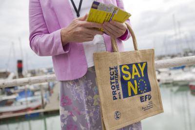 A supporter of the ‘Say No To The EU’ campaign hands out leaflets in Ramsgate, Kent, on 7 September 2015. Photo by Getty Images.