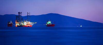 Cargo ship loaded with a jack-up rig. Photo: Getty Images.
