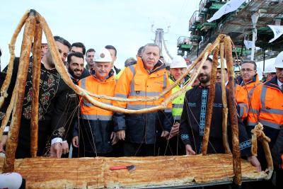 Turkish President Recep Tayyip Erdogan attends a ceremony commemorating the placement of the final section of Yavuz Sultan Selim Bridge in Istanbul on 6 March 2016. Photo by Getty Images.