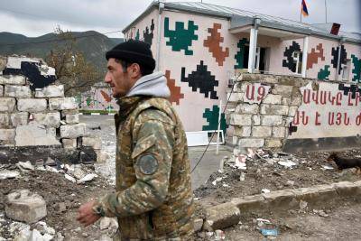 A damaged wall in the village of Mataghis on 6 April 2016. Photo by Getty Images.