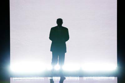 Donald Trump enters the stage on the first day of the 2016 Republican National Convention. Photo by Getty Images.