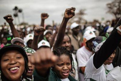 Supporters of the Zambian ruling party Patriotic Front at the closing rally of President Edward Lungu's campaign on August 10, 2016 in Lusaka. Photo by GIANLUIGI GUERCIA/AFP/Getty Images.