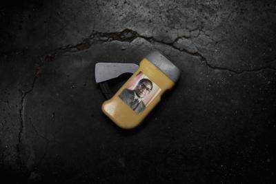 A wind-up torch handed out by the ruling ZANU-PF party during their election campaign in 2013 lies on the floor of a home without any power in Bulawayo, Zimbabwe. Photo by Getty Images.