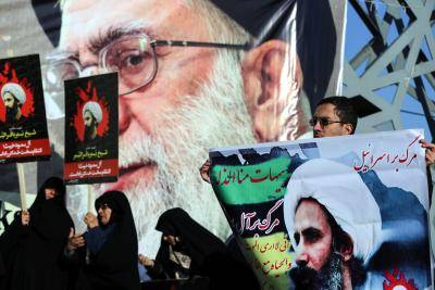 Demonstrators in Tehran protest against the execution of prominent Saudi Shia cleric Nimr Baqir al-Nimr on 4 January 4 2016. Photo by Getty Images.