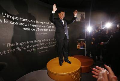 Xi Jinping visits the Olympic Museum in Lausanne following his speech at Davos. Photo by Getty Images.