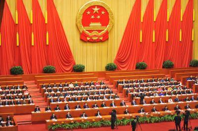 The Great Hall of the People during the closing ceremony of China's National People's Congress on 15 March 2015 in Beijing, China. Photo via Getty Images.