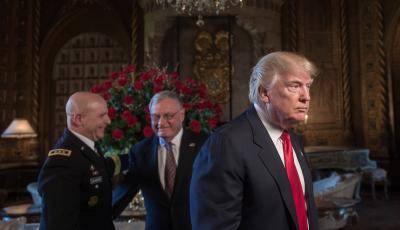 Donald Trump with HR McMaster, the new national security advisor, and his chief of staff, Keith Kellogg. Photo: Getty Images.