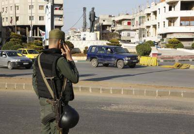 Syrian government forces tighten security in Homs after suicide attacks on 25 February. Photo: Getty Images.