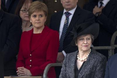 Nicola Sturgeon and Theresa May attend the commemoration of the Iraq and Afghanistan memorial in London. Photo: Getty Images.