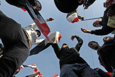 Supporters of Muqtada al-Sadr demonstrate in Baghdad on 8 February to demand political reform. Photo: Getty Images.