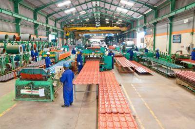 Industrial complex for the production of galvanized roof sheets, Kampala, Uganda. Photo: Getty Images.