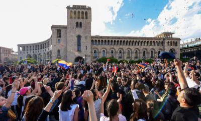 People celebrate Serzh Sargsyan’s resignation in downtown Yerevan on 23 April 23. Photo: Getty Images.