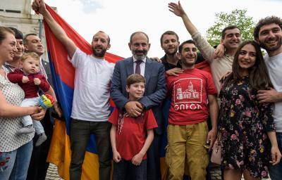 Armenian Prime Minister Nikol Pashinyan poses for pictures with locals during his visit to the disputed territory of Nagorny Karabakh on 9 May. Photo: Getty Images.
