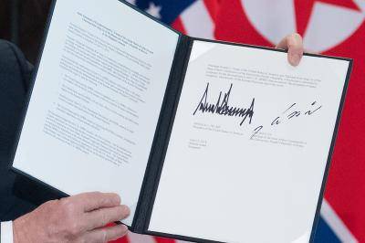 The document signed by Donald Trump and Kim Jong-un after their meeting in Singapore. Photo: Getty Images.