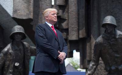 Donald Trump stands in front of the Warsaw Uprising Monument on Krasinski Square on 6 July 2017 in Warsaw, before delivering a speech where he argued that the future of Western civilization is at stake. Photo: Getty Images.